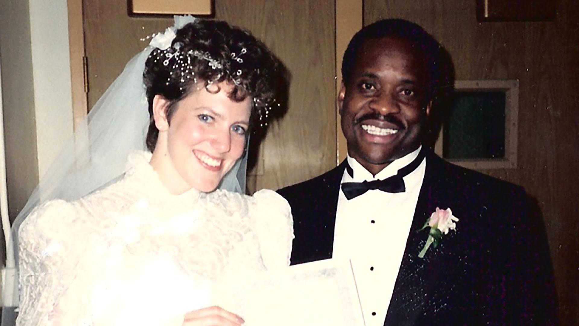 Clarence Thomas and his new wife Virginia displaying their marriage license on their wedding day.