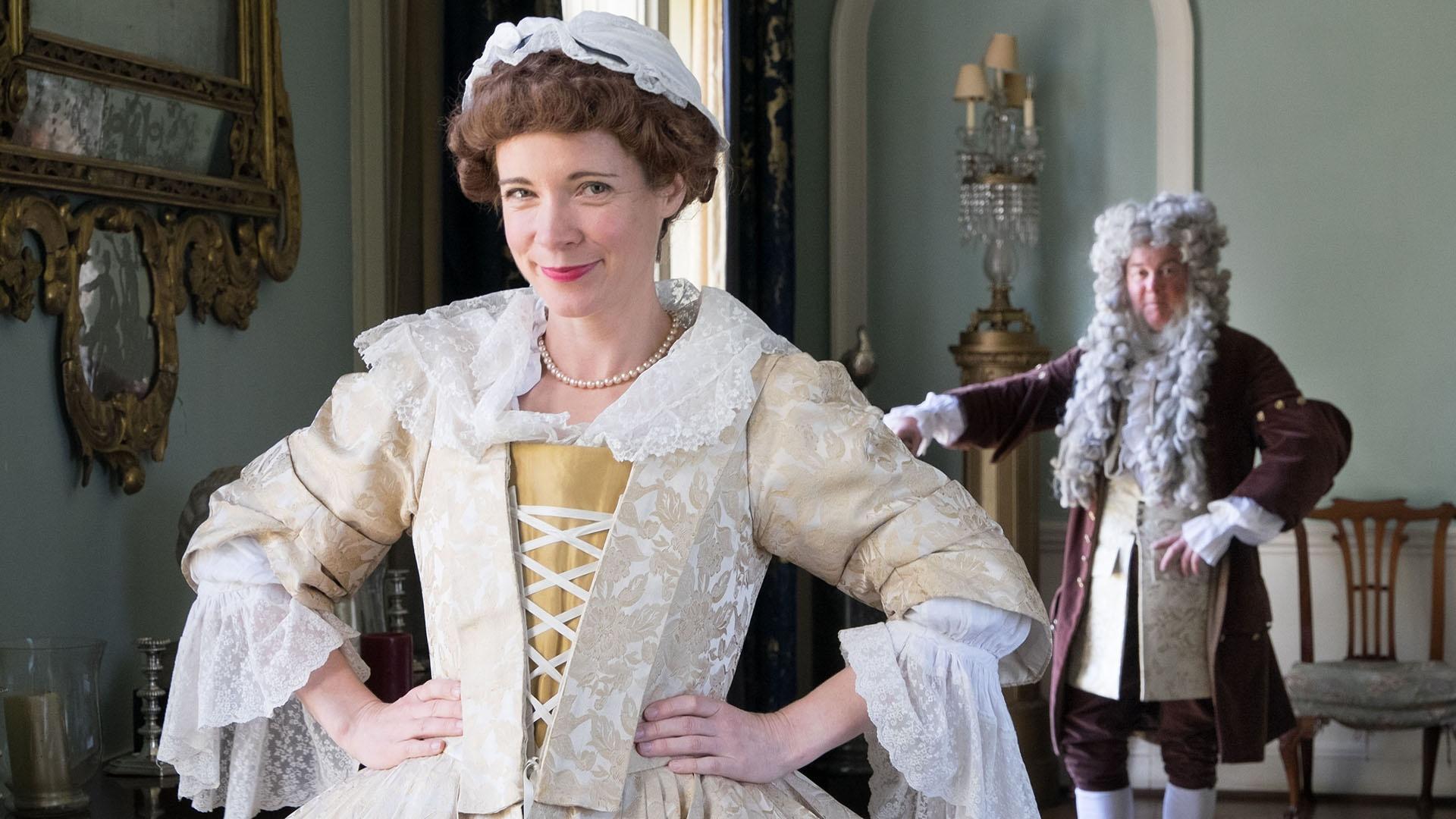 Lucy Worsley dressed in period costume.