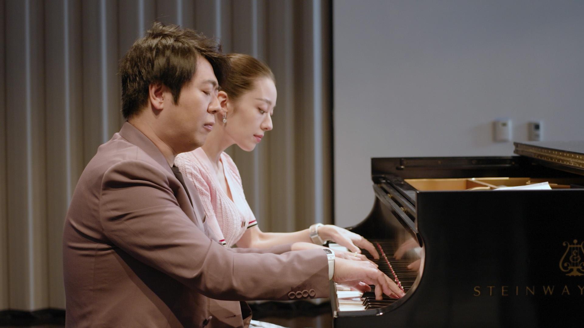 Lang Lang and Gina Alice play the piano in Lafayette, CA.