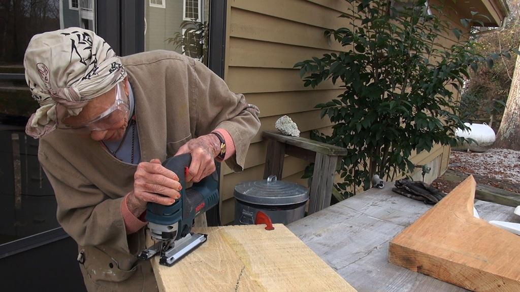 Lilian Thomas Burwell works on a sculptural piece at her home in Highland Beach, Maryland.