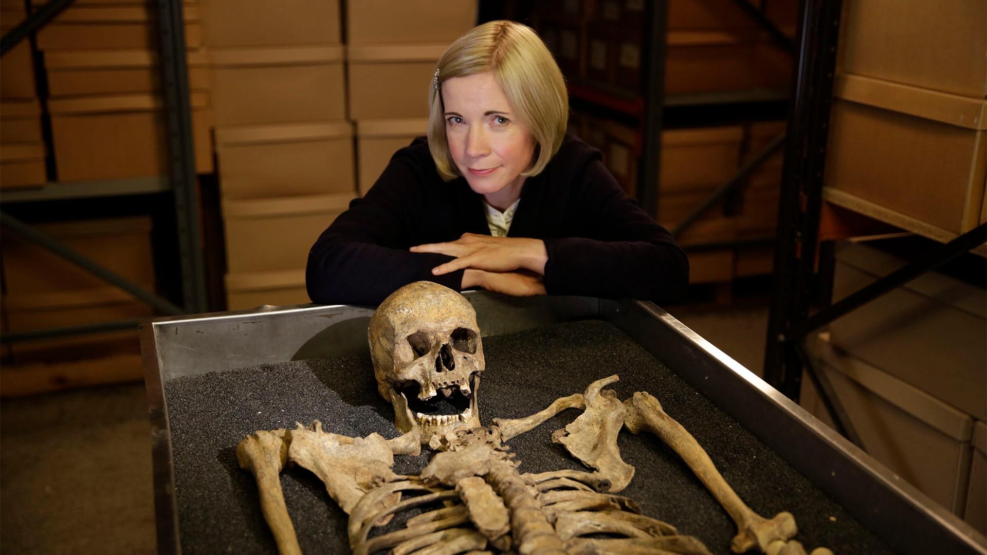 Lucy with Black Death skeleton at the Museum of London.