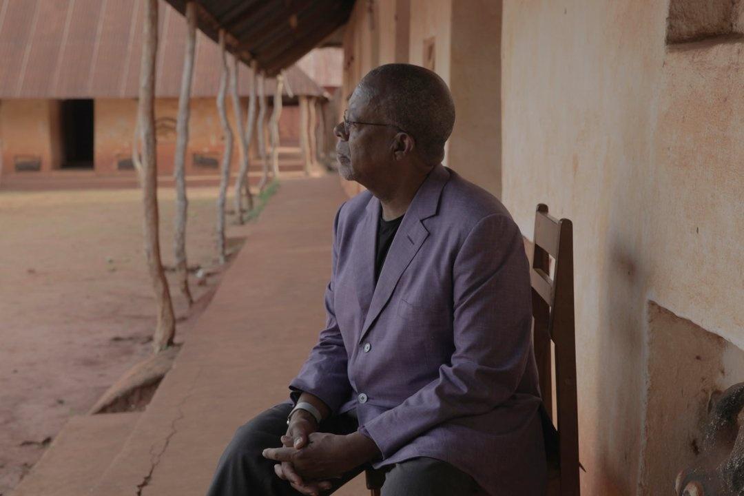 Henry Louis Gates, Jr. takes a moment to observe the Royal Palaces (a UNESCO World Heritage site) in Abomey, Benin.
