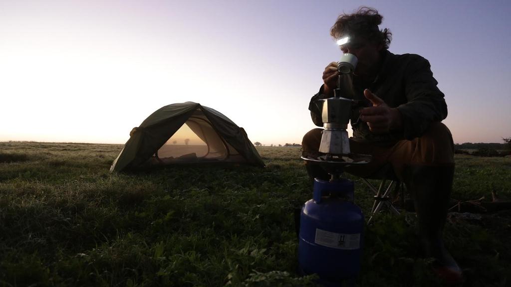 Morning coffee fuels Bob Poole before he starts filming the morning "golden hour."