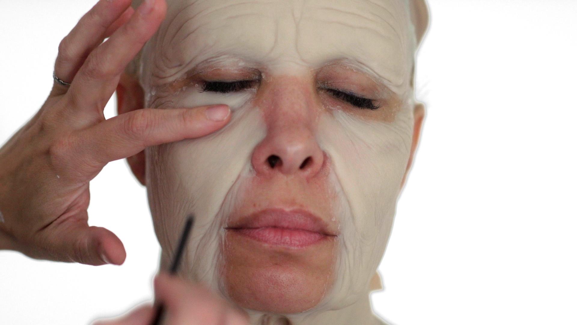 With the help of prosthetics and make-up, Carol is transformed into her 80 year-old self.