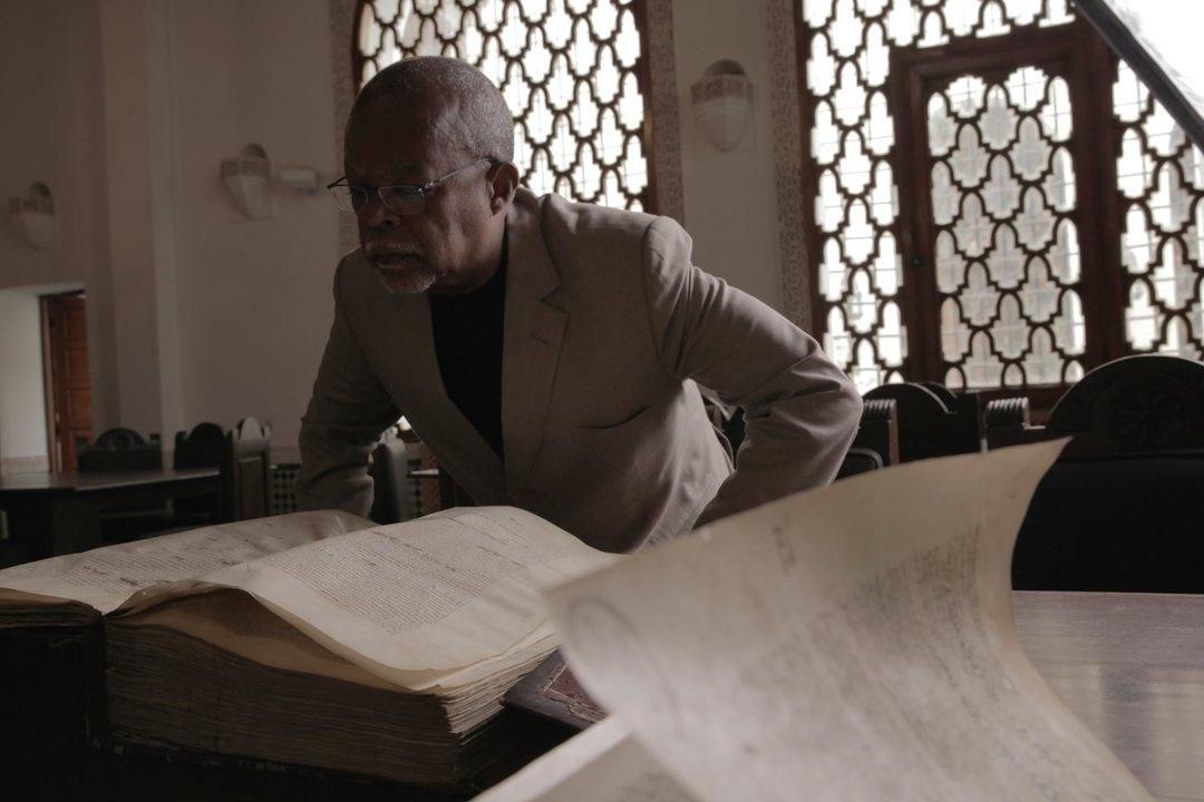 Immersed in an old manuscript, Henry Louis Gates, Jr. reads on at the world's oldest working library Al-Karaouine Library in Fes, Morocco.