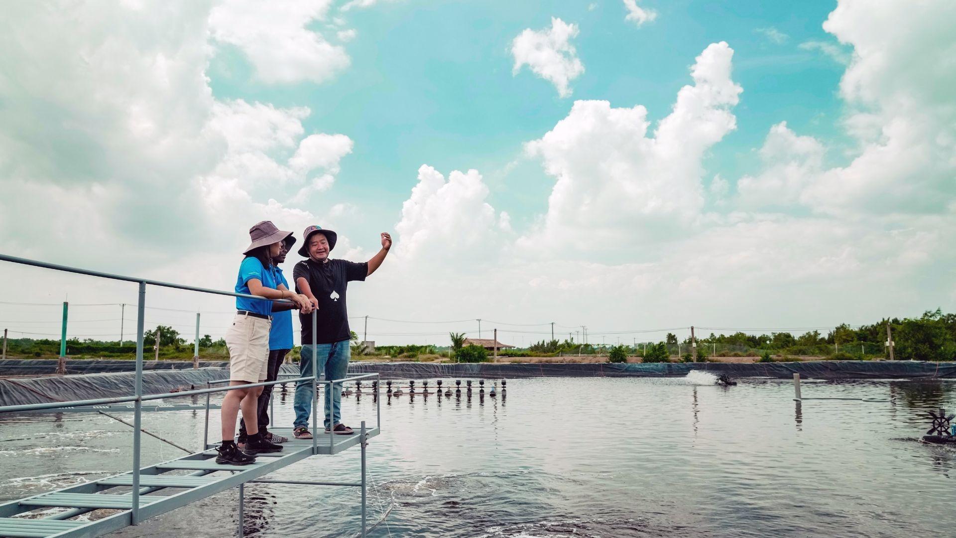 Dr. Loc Tran and staff at a shrimp demonstration farm.