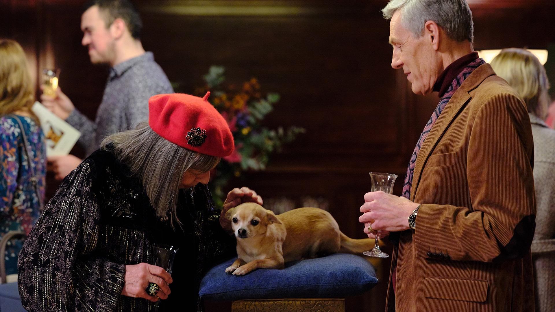 Image of Adelaide Tempest speaking with the dean.