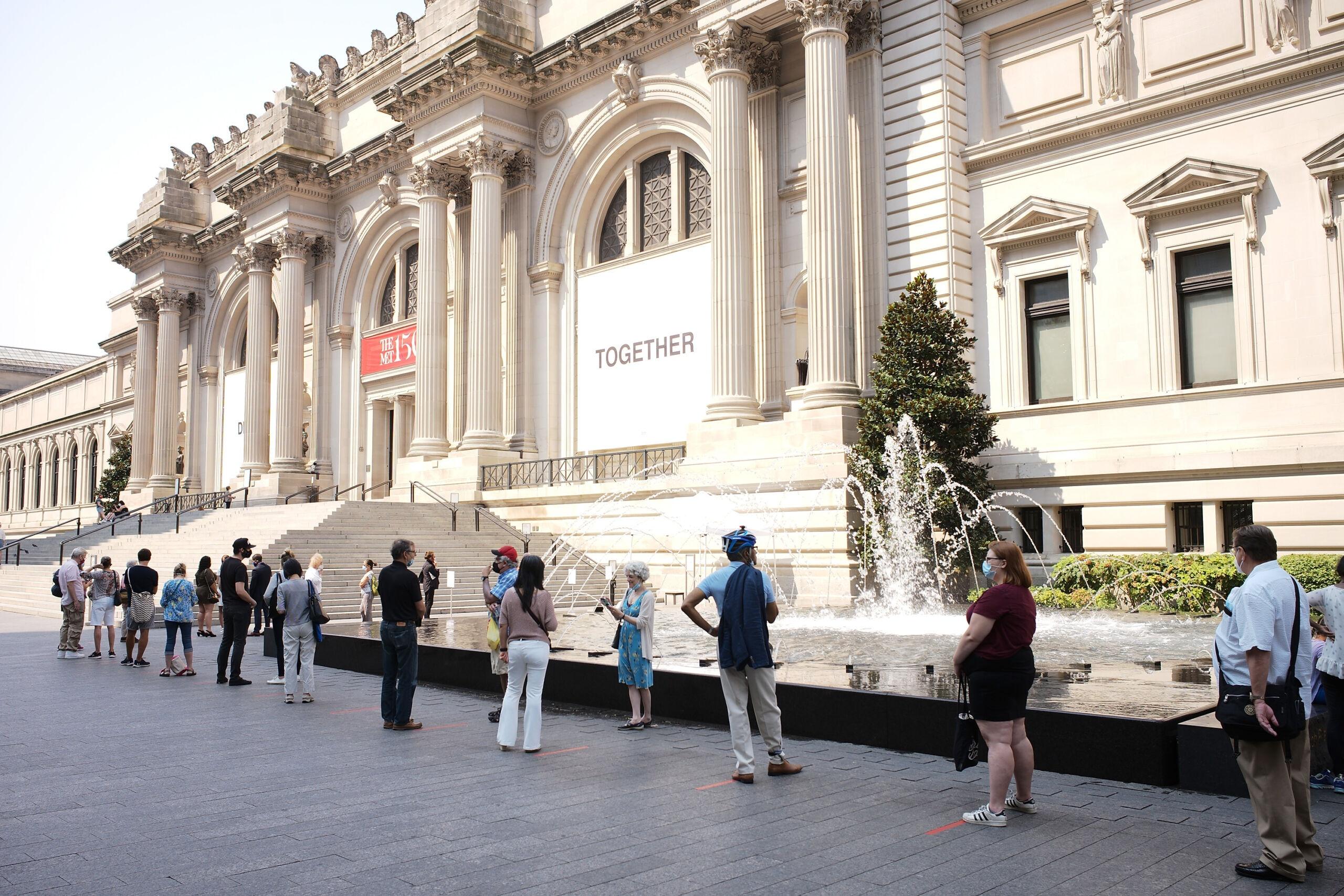 Visitors queue to enter as The Met reopens in August 2020 after Covid 19 lockdown closure. 