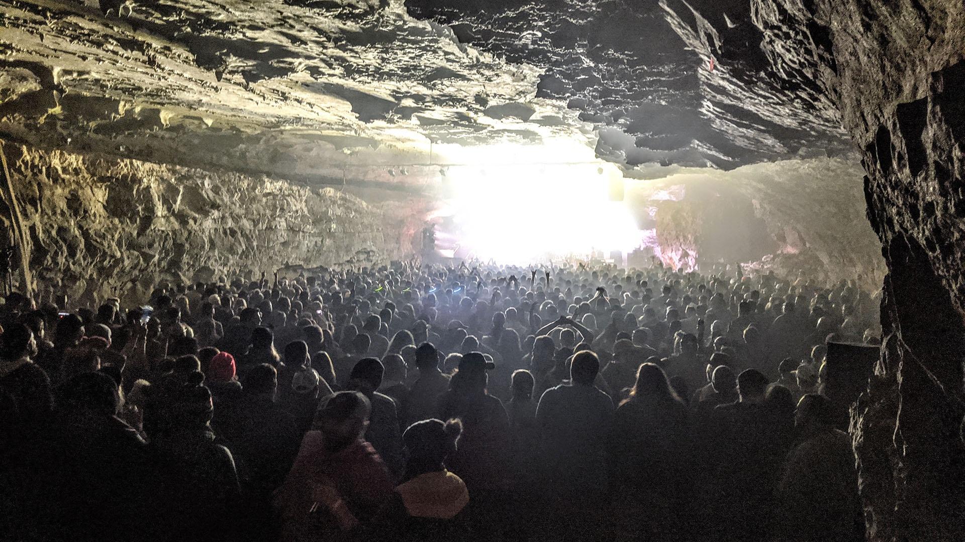 Fans standing in The Caverns during a "Bluegrass Underground" show.