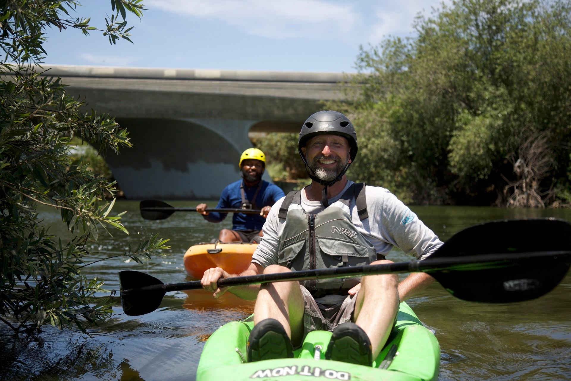 George Wolfe kayaking with Baratunde Thurston at the Sepulveda Basin