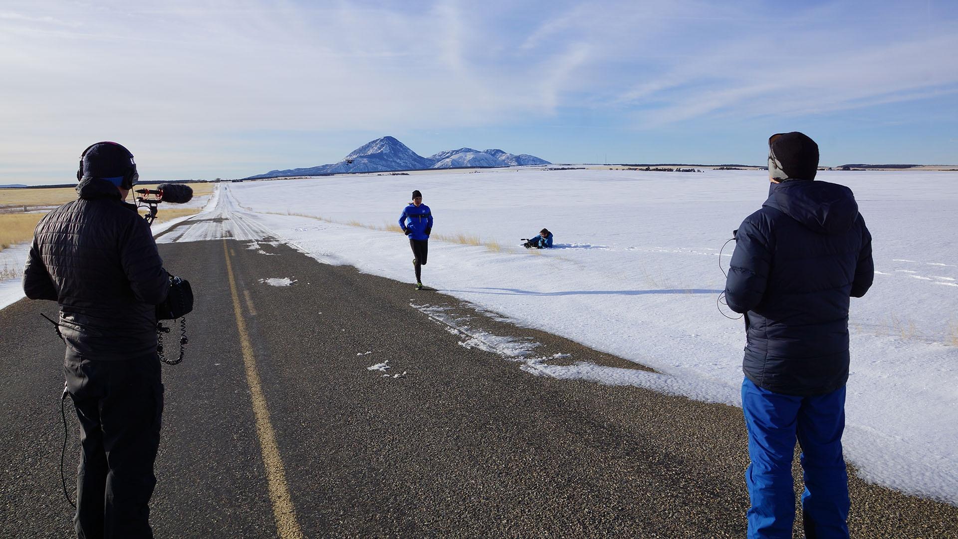 Ultra marathoner Shaun Martin runs on an empty stretch of road. 