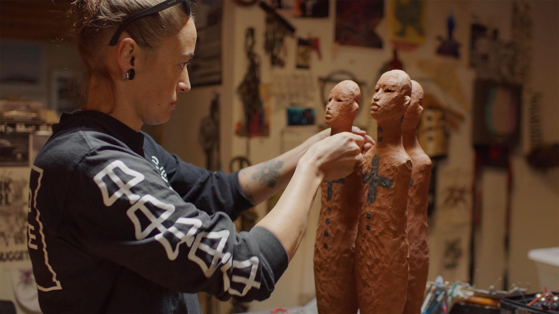 Production still of Rose B. Simpson working in her studio in Santa Clara Pueblo, New Mexico.