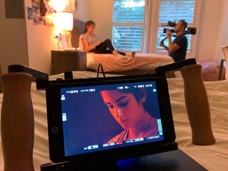 Christopher Ewers (Director of Photography) films Lydia in her room at a California rehab facility. 