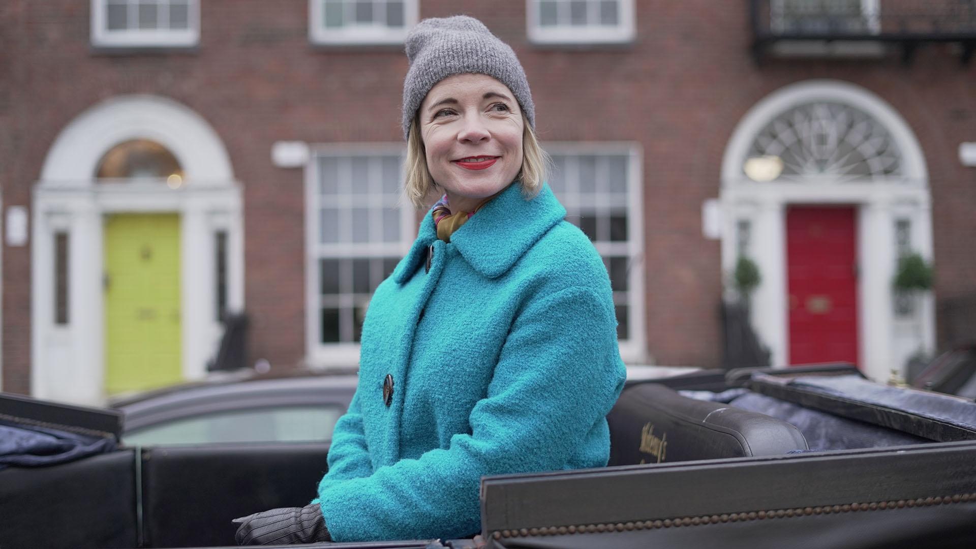 Lucy Worsley on a horse and carriage in Dublin.