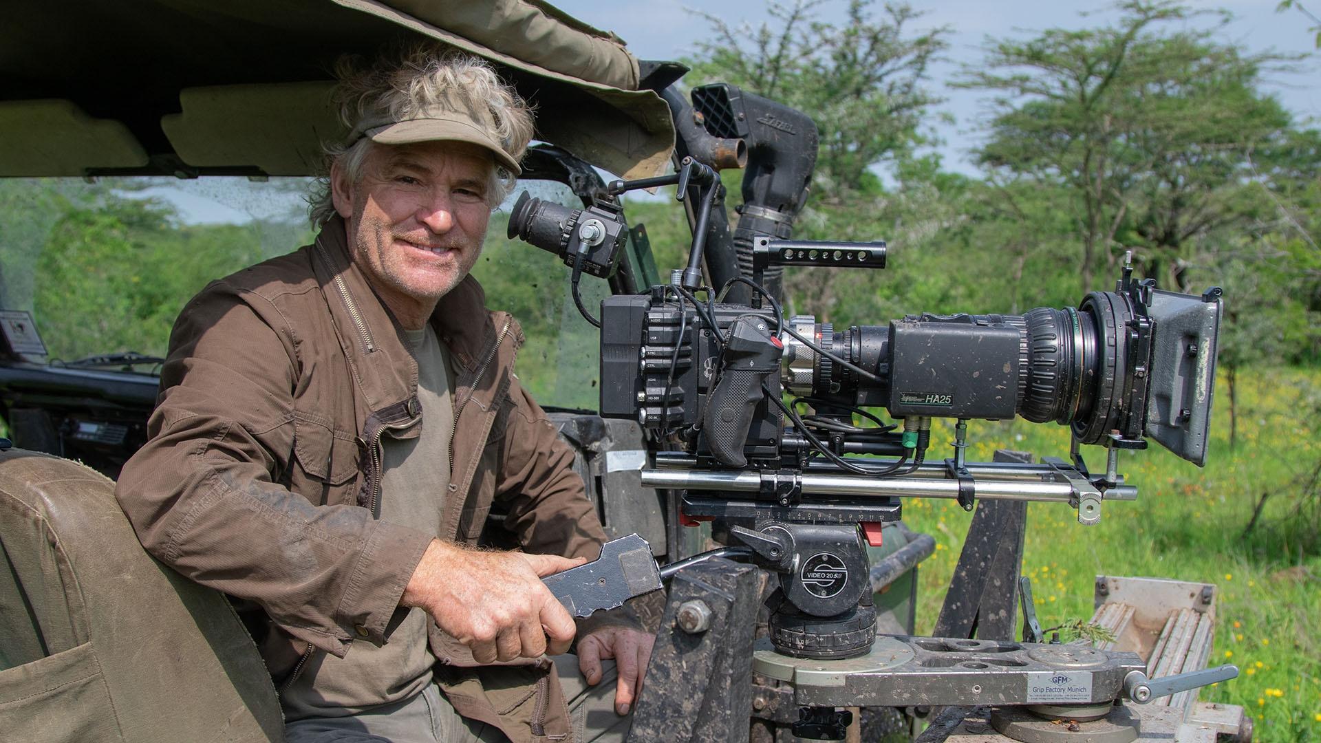 Bob Poole sets up his camera to film Mwiba’s wildlife residents.