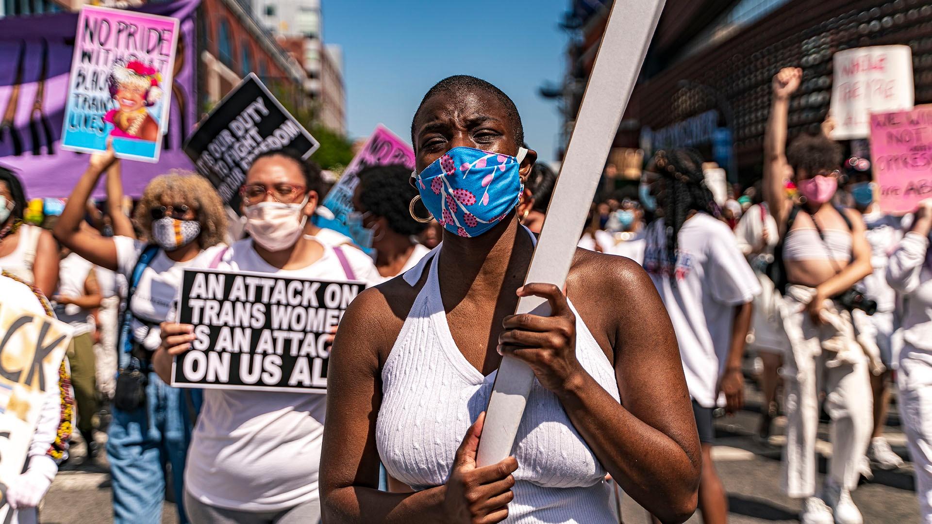 Woman marching in a Black Trans Lives Matter protest.
