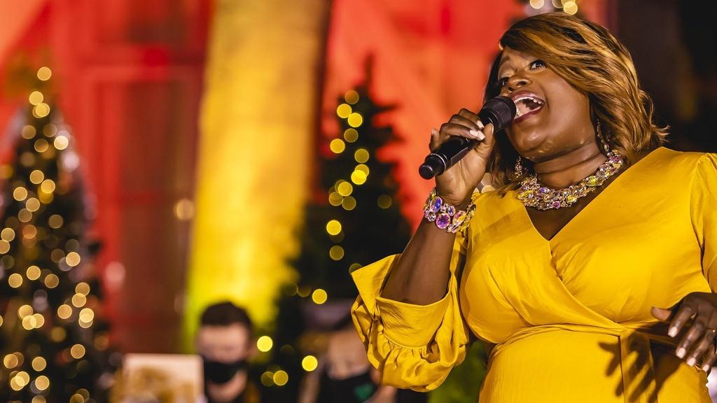 Image of Nova Y. Payton performing "Rudolph the Red-Nosed Reindeer."