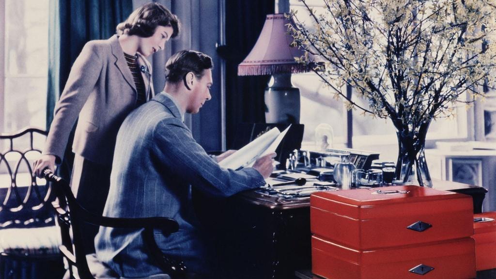 Princess Elizabeth talking to her father, King George VI.