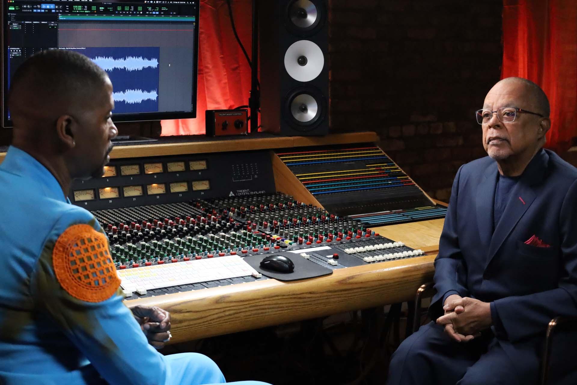 Host, Henry Louis Gates Jr. interviews Donald Lawrence in a recording studio for GOSPEL