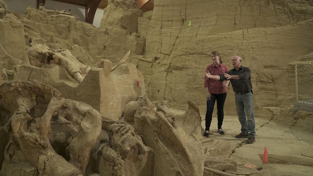 Prehistoric Road Trip host Emily Graslie and Jim Mead at The Mammoth Site in Hot Springs, SD.