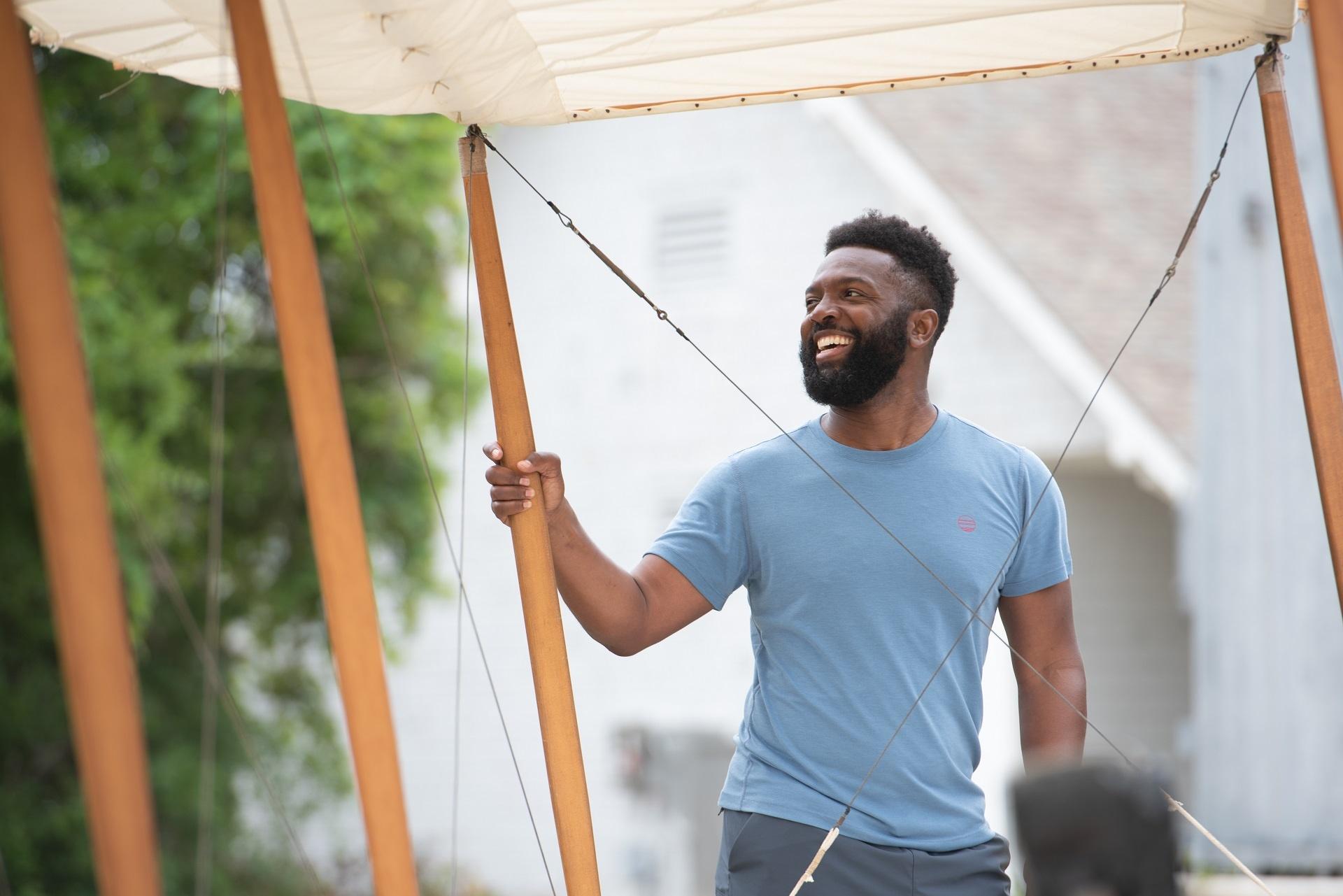 Baratunde Thurston gets ready to fly a replica of a Wright brothers plane in North Carolina