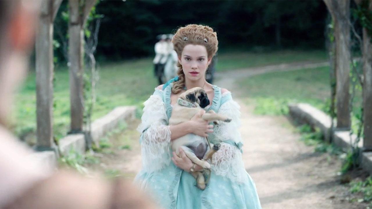 Marie Antoinette holds a pug named Mops.