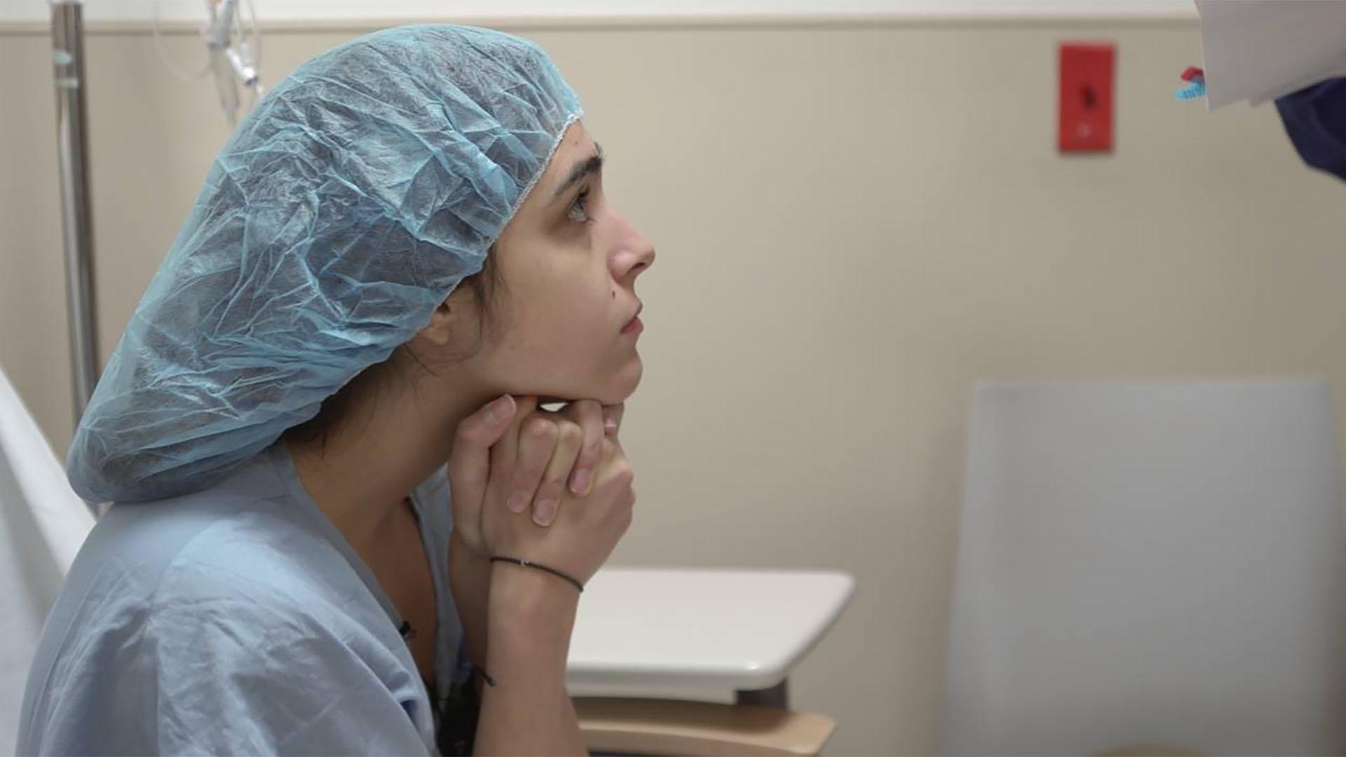 An endometriosis patient waits in pre-operative area for surgery.