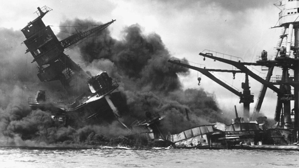 The battleship USS Arizona sinking after being hit by Japanese air attack on Dec. 7, 1941.