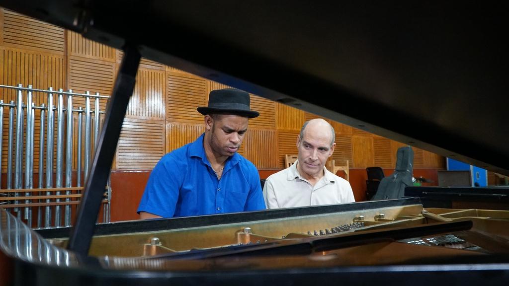Musician Roberto Fonseca with Geoffrey Baer.
