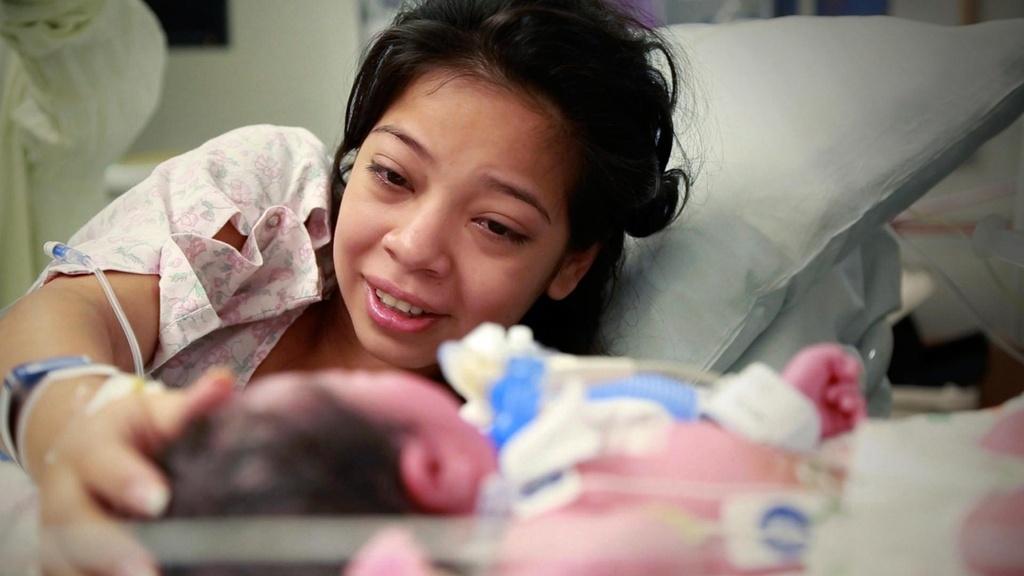 Lesly seeing her baby, Lilly, for the first time.