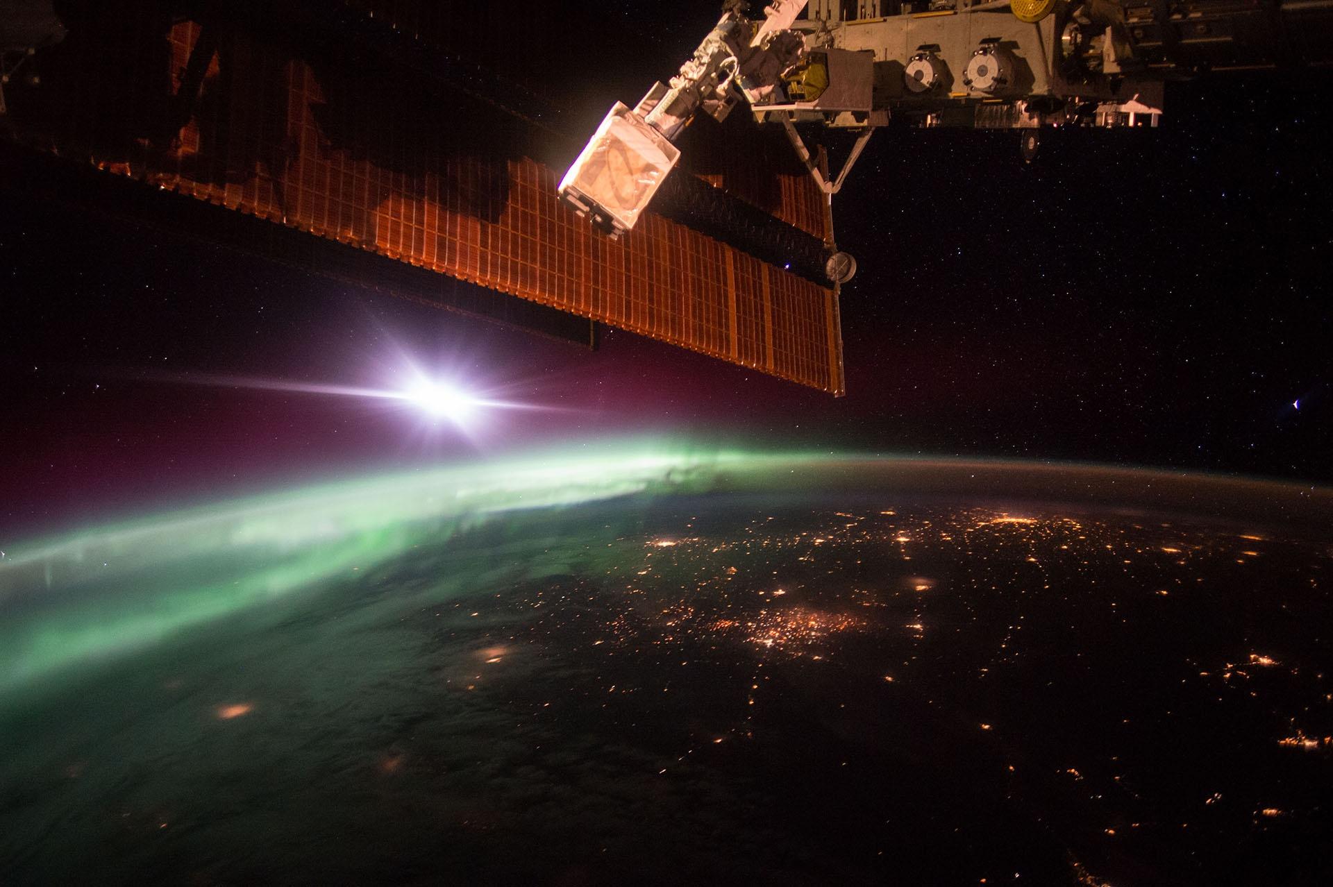 NASA astronaut Scott Kelly captured this photo of the green lights of the aurora.