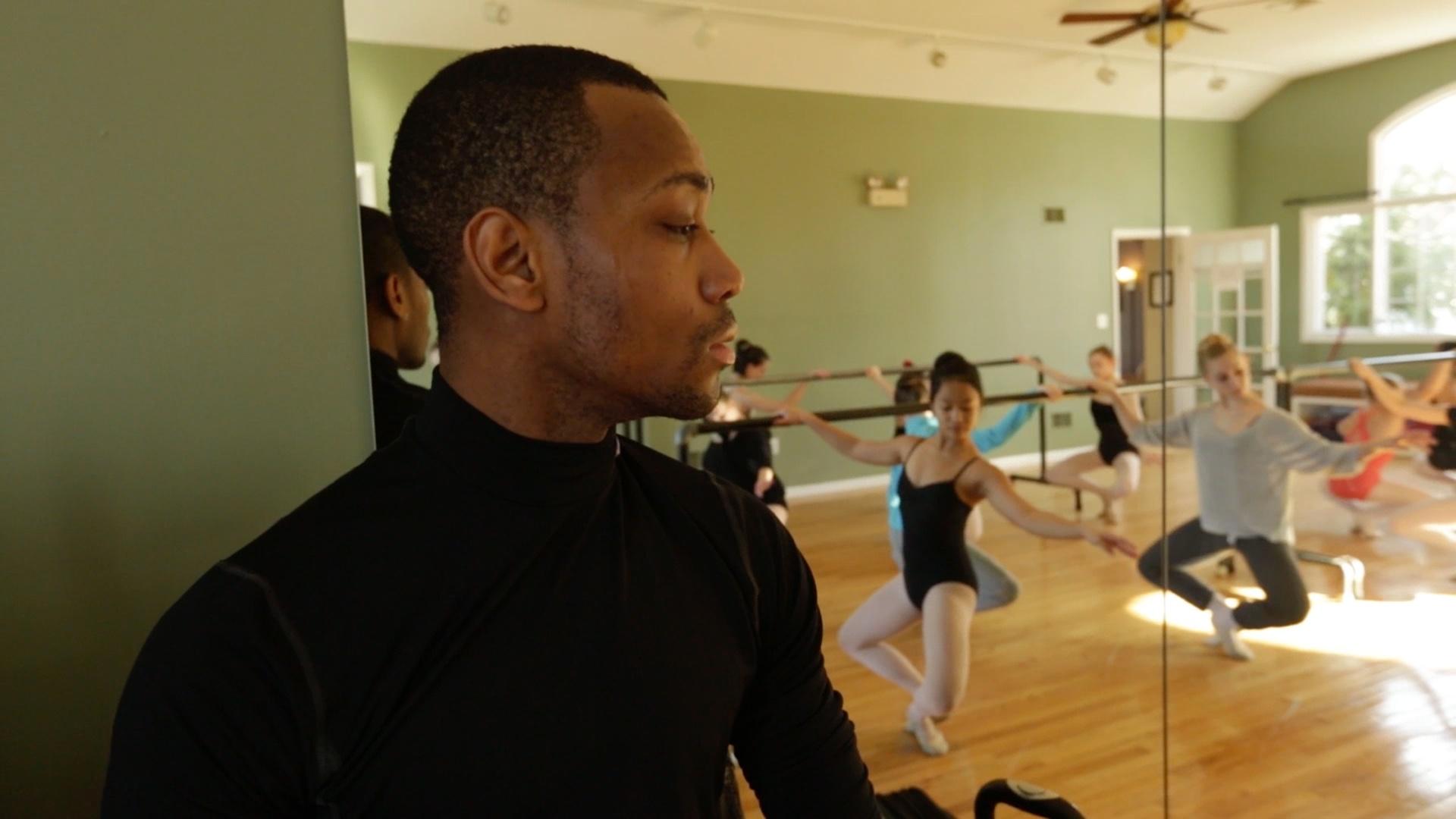 Fredrick Davis observes young ballet students at work in New Jersey, where he instructs a class.
