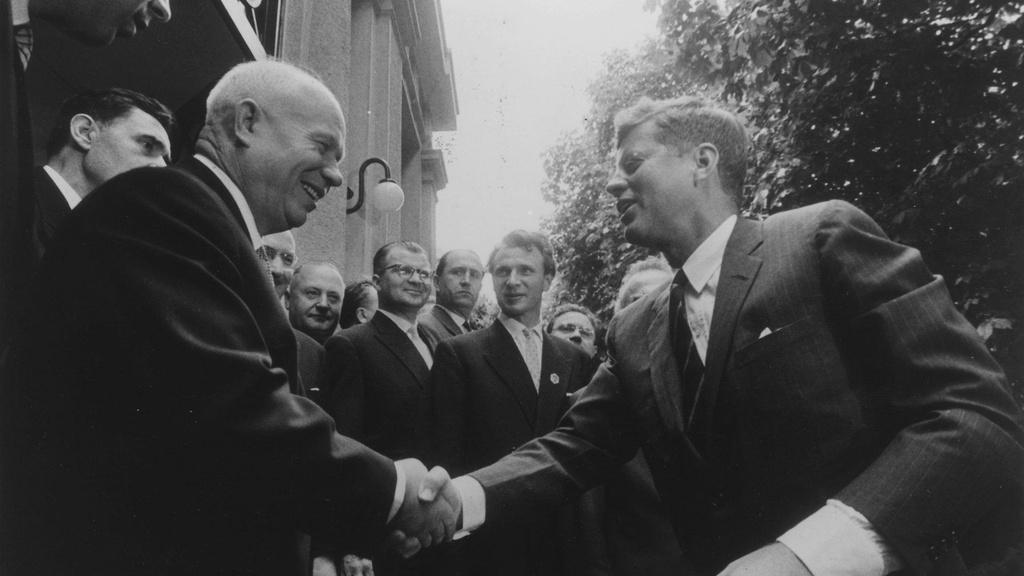 John F. Kennedy and Nikita Khrushchev shaking hands at the end of the Cuban Missile Crisis.