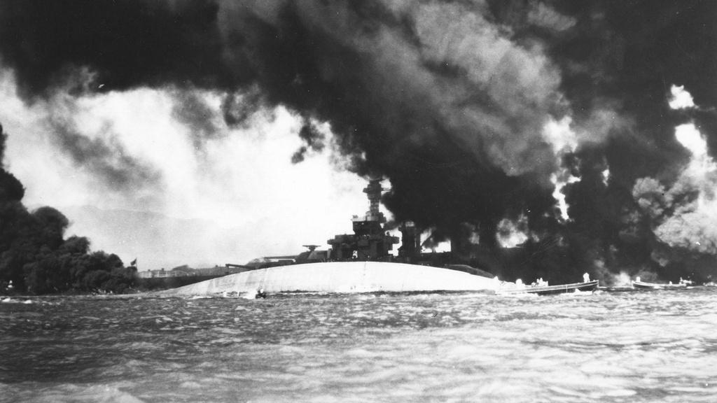 Photograph of the capsized USS Oklahoma after the Japanese attack on Pearl Harbor.