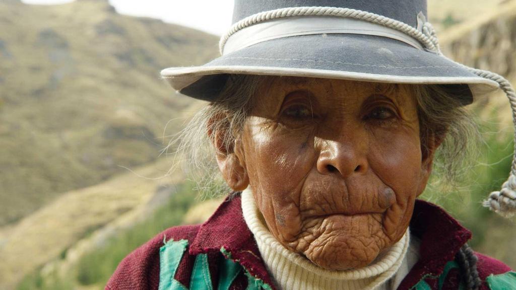 An elderly villager in traditional clothing, Peruvian Andes.