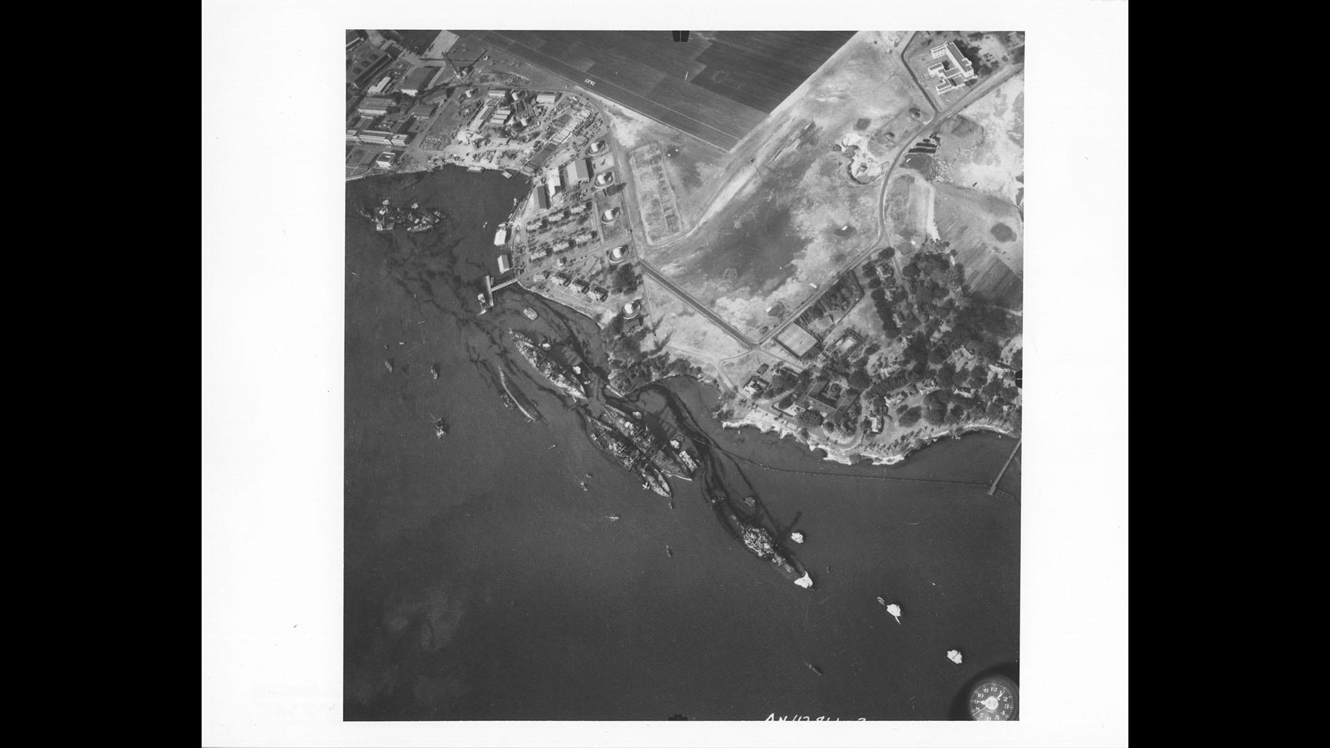 Photograph of ships at Pearl Harbor following Japanese attack.