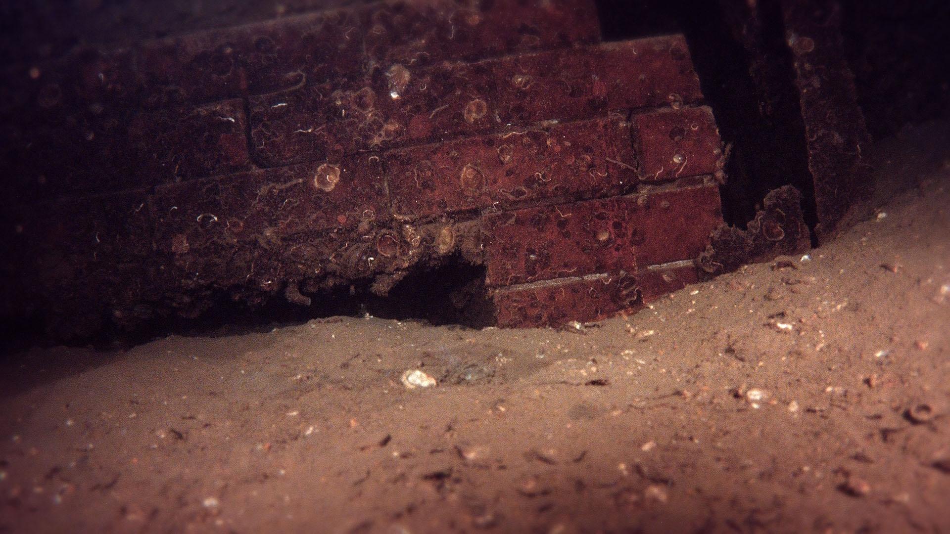 A fireplace within the USS Arizona, found in the Admiral's Cabin.