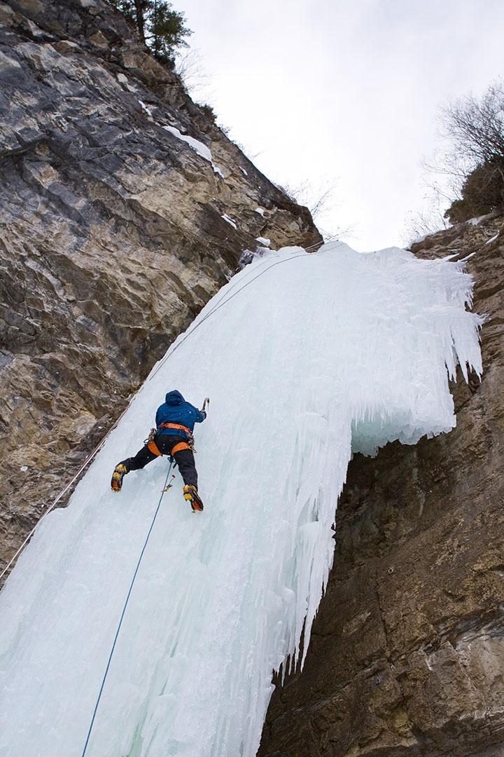 Aaron Mulkey climbing a frozen waterfall. 