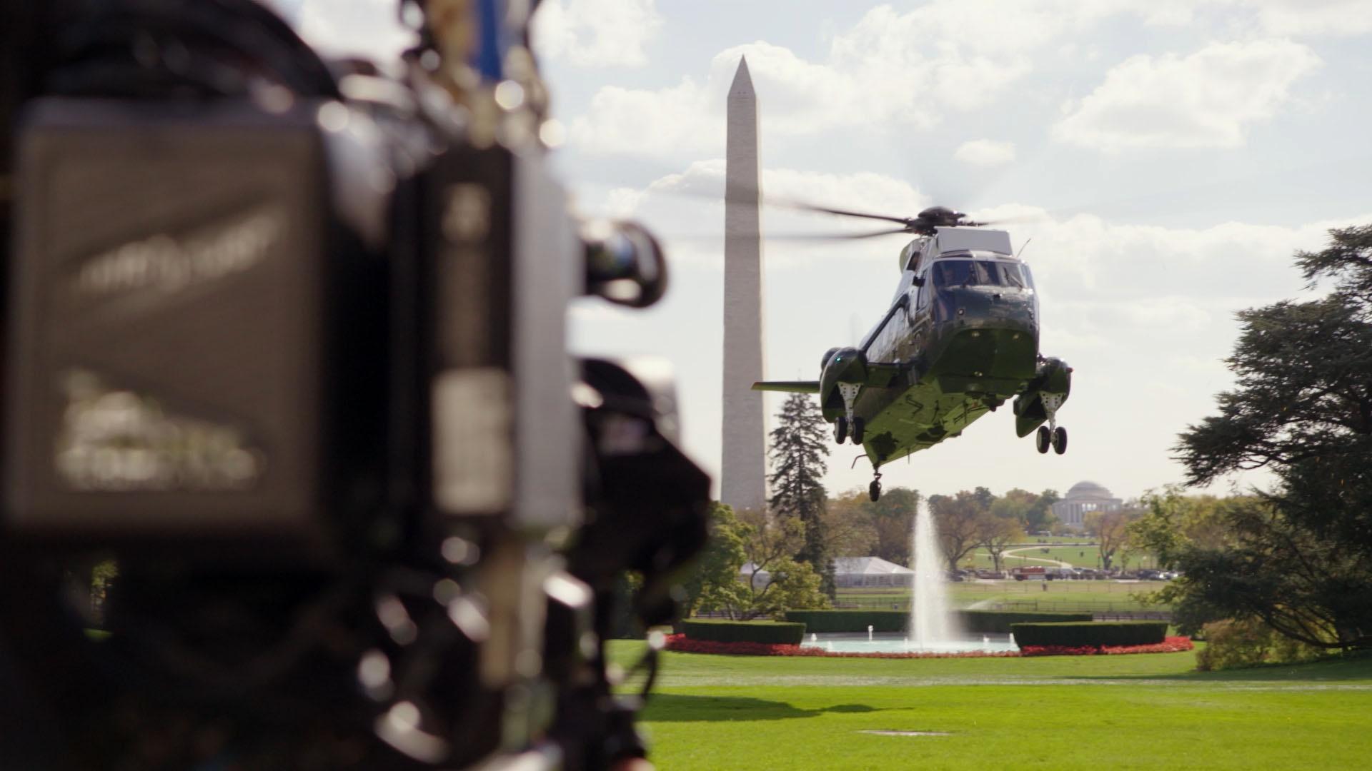 Marine One landing on White House lawn.