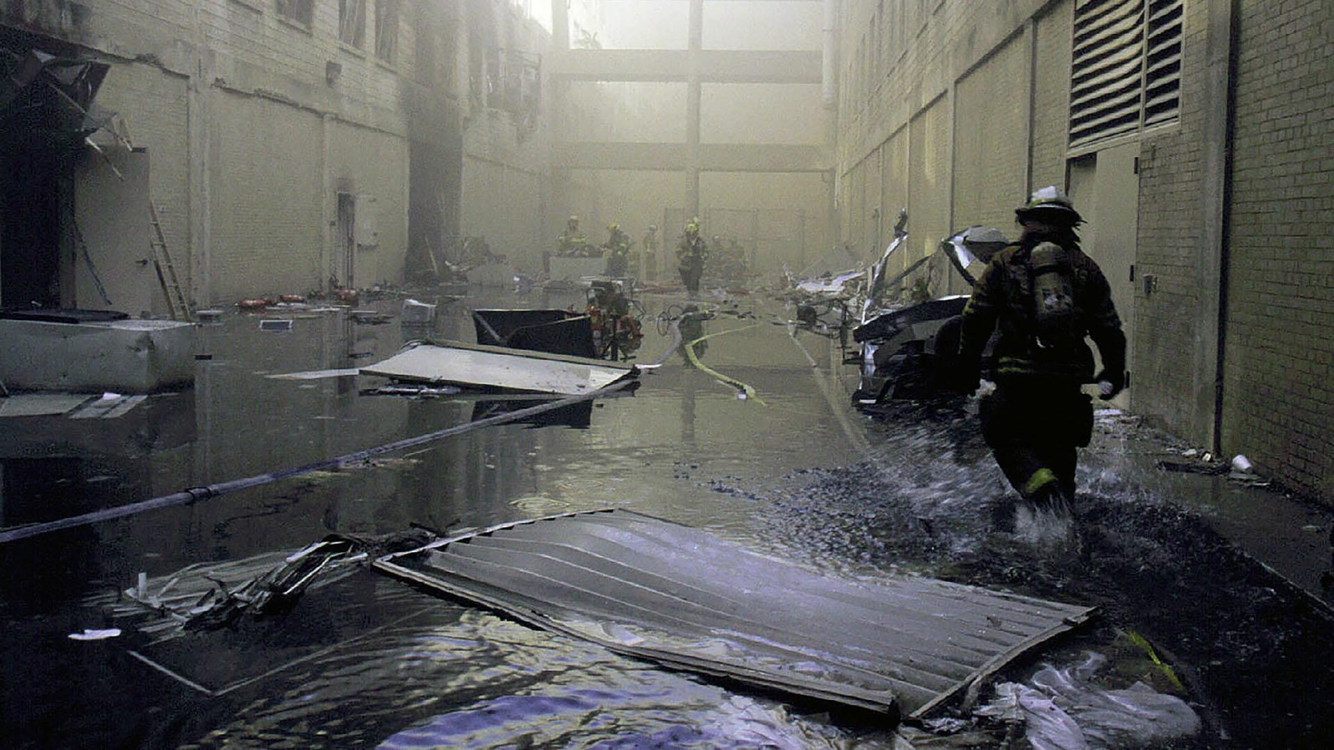 The Pentagon, post-9/11 attack. First responders walk through "AE" Drive.
