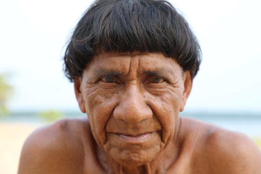Ira, the former village Shaman, prepares for fishing expedition. Matto Grosso, Brazil.