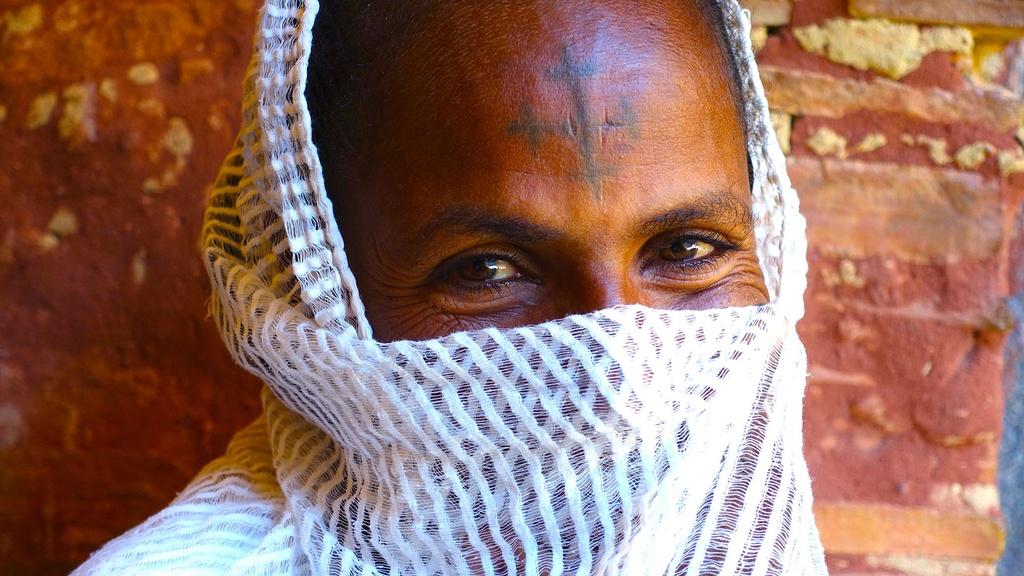 Villager attending baptism. Tigray, Ethiopia.