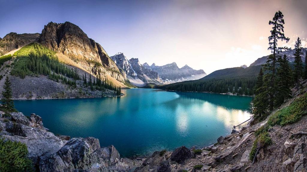 The emerald waters of Moraine Lake at sunset.