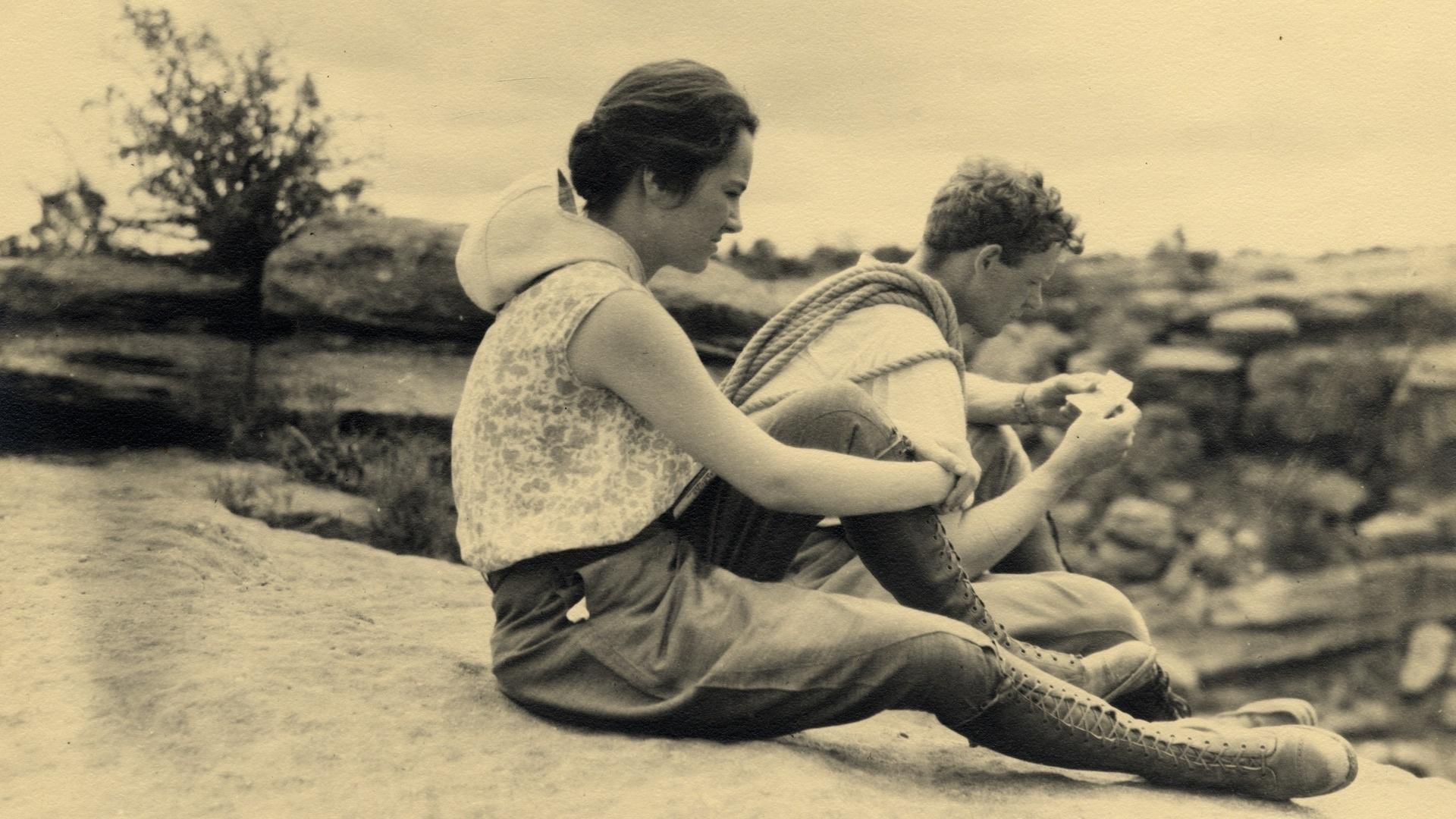 Anne and Charles sitting on a cliff, 1929.