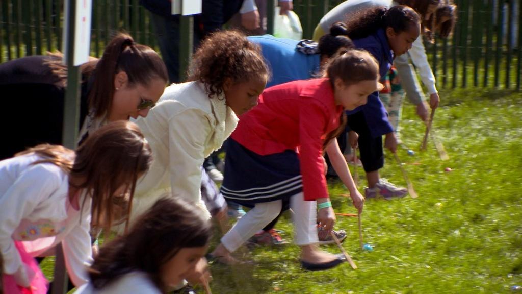Kids at starting line for Easter Egg Roll on White House Lawn.