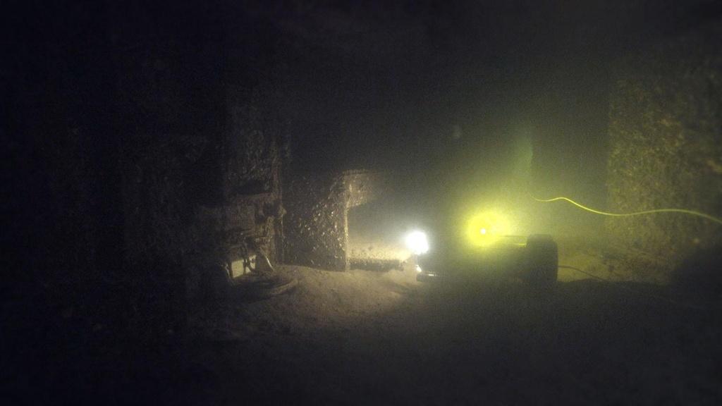 One of Woods Hole's ROVs (Remote Operated Vehicle) within the Arizona, at a distance.