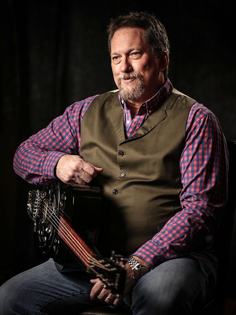Still of Jerry Douglas sitting with instrument