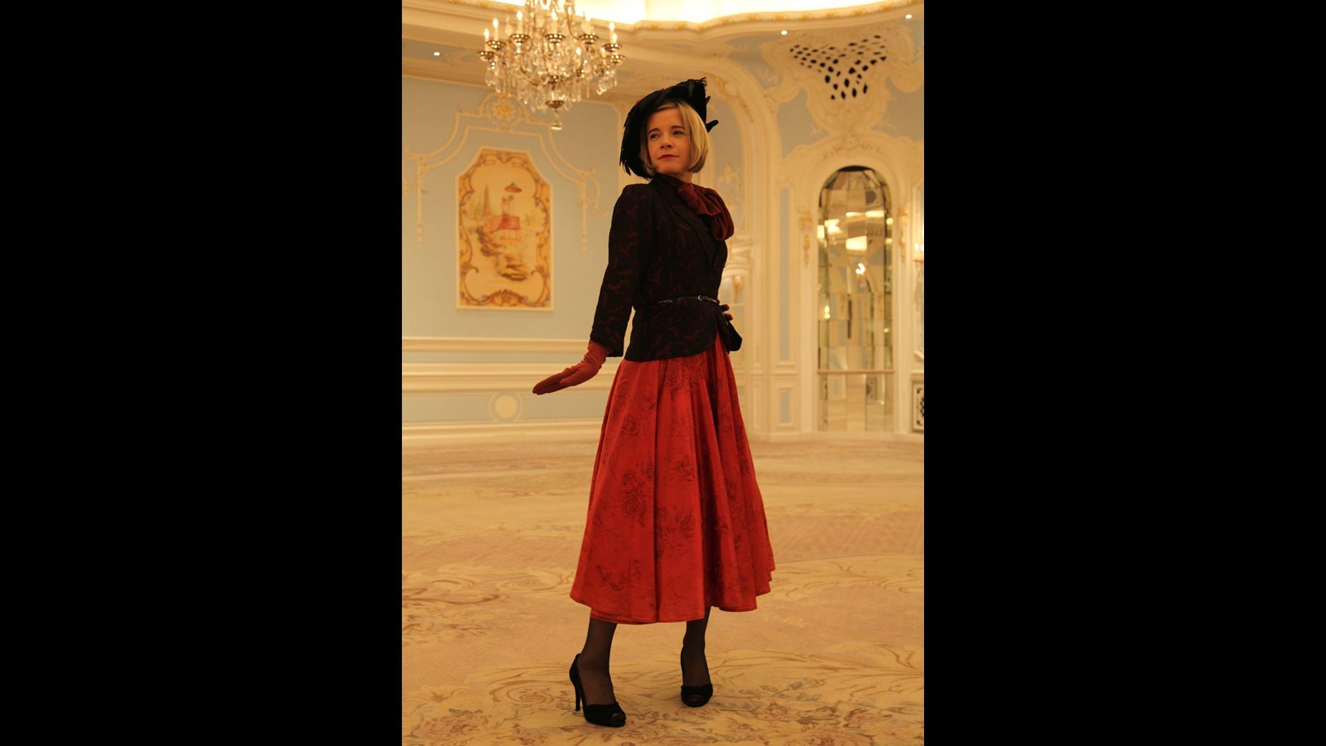 Lucy wearing a Dior-style costume at the Savoy.