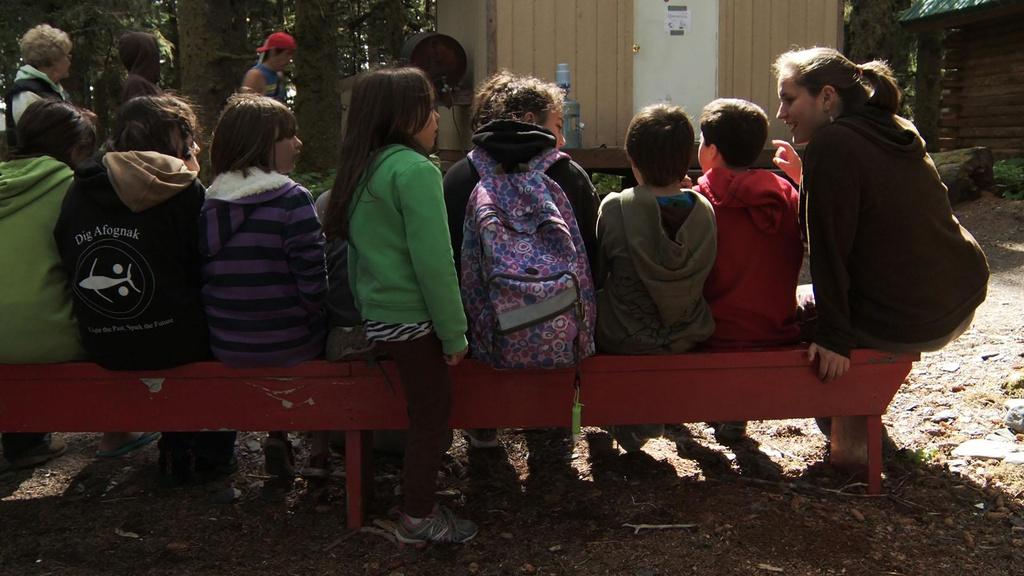 Image of Candace Branson teaching kids at Dig Afognak camp.