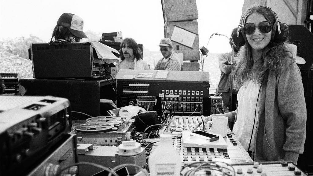 The Grateful Dead's Betty Cantor records the band's live performance on stage in 1978